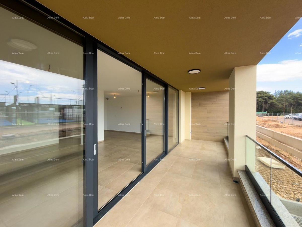 "Apartment in a New Building with Two Garage Spaces!"