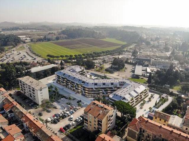 Poreč, stanovanjsko-poslovni objekt s apartmaji in podzemnimi garažami
