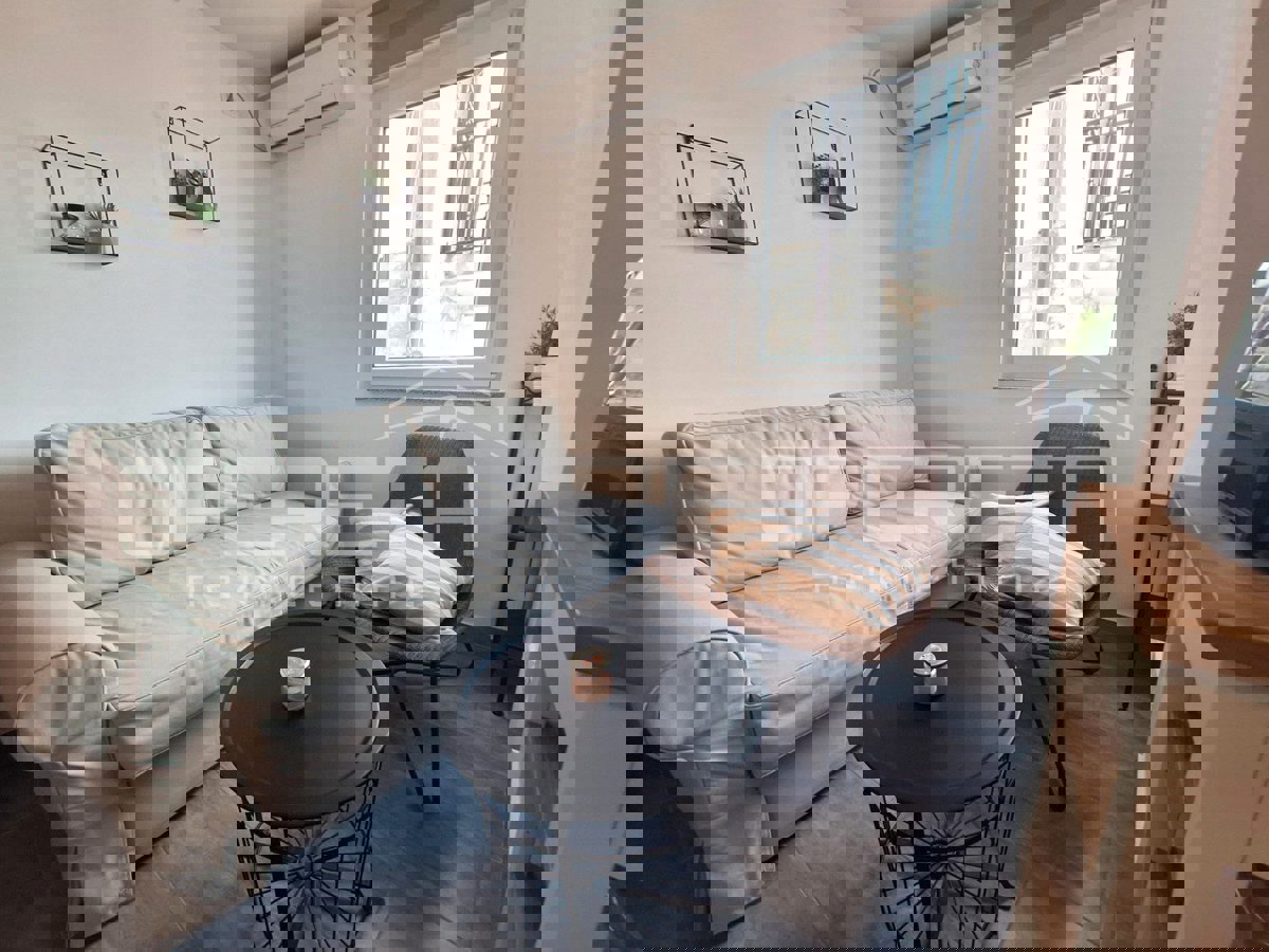 TRIBUNJ